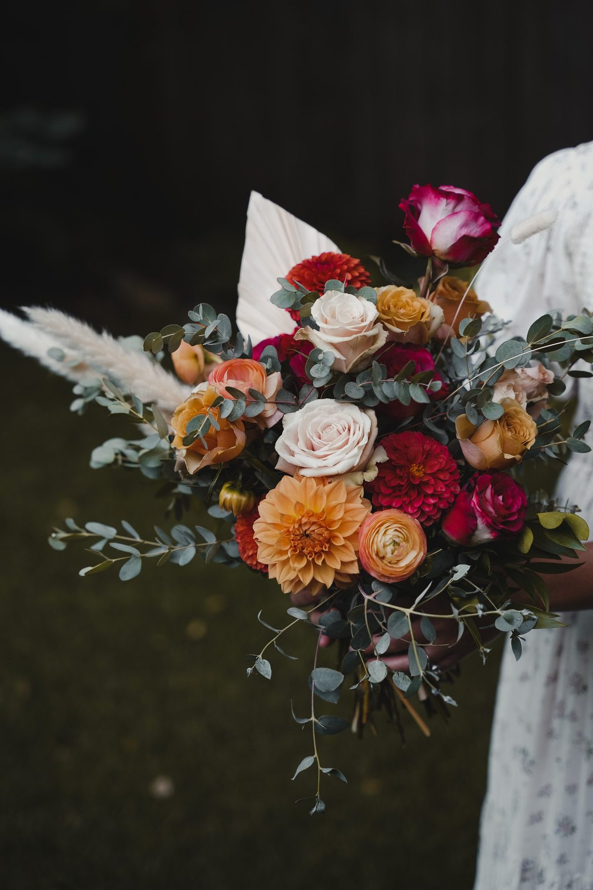 Autumn wedding arrangement in rust and gold tones